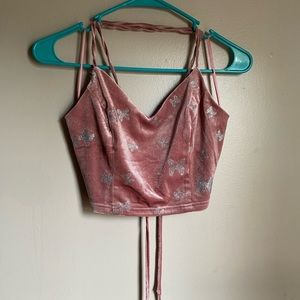 Pink butterfly tank top criss cross back barley worn. No stains or holes. Medium